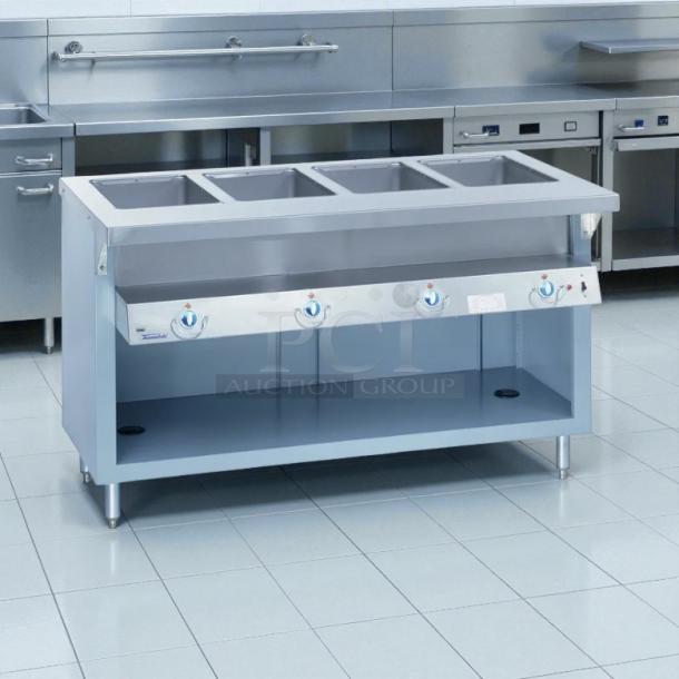 Duke E304 Aerohot Electric 4-Well Steamtable, great condition, 208V, tested, silver with control knobs, commercial use.