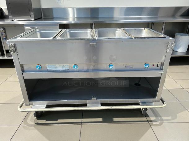 Duke E304 Aerohot Electric 4-Well Steamtable, 208V; great condition, tested and working. Features blue heat control knobs.