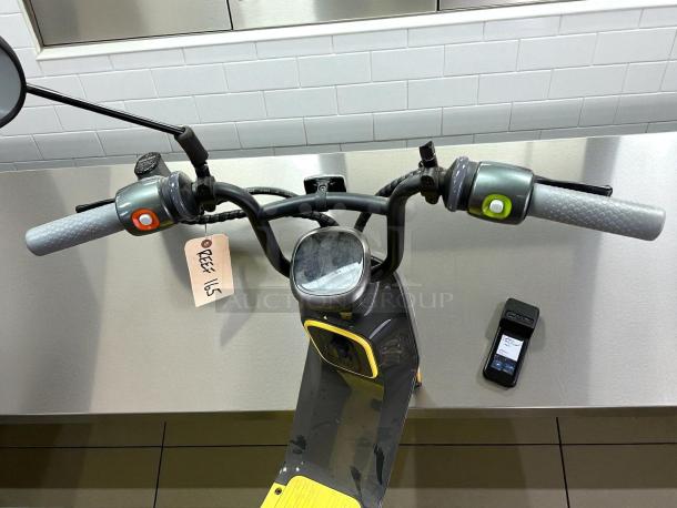 Segway eMoped C80 scooter in like-new condition; features grey handlebars with colored buttons, tag labeled "EEEX 165."