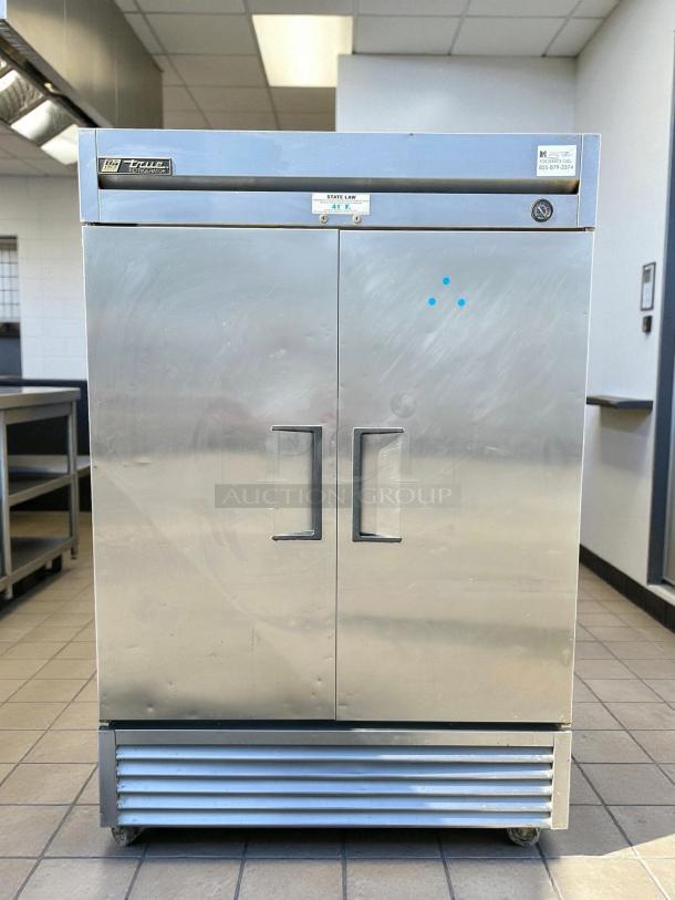 True TS-49-HC stainless steel double door refrigerator in excellent condition, model label visible, tested and working.