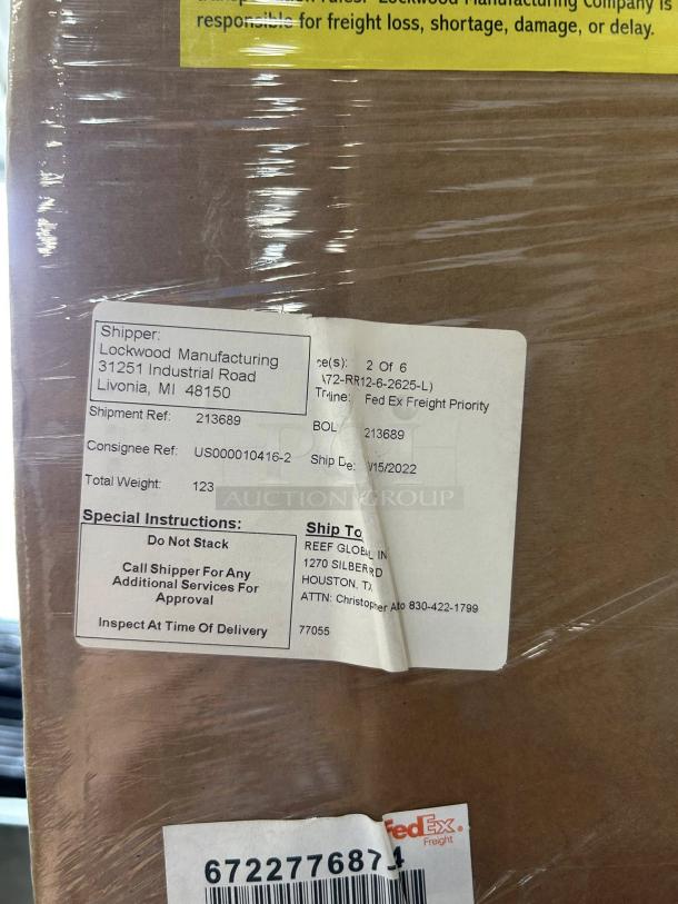 Brand new Lockwood CA72-RR12-6-R proofing/holding/display cabinet, 18 pan capacity. Labels show shipping details and instructions.