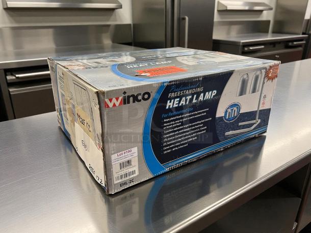 Winco EHL-2C Heat Lamp in original packaging on a metal surface, showing product details and model number on box.
