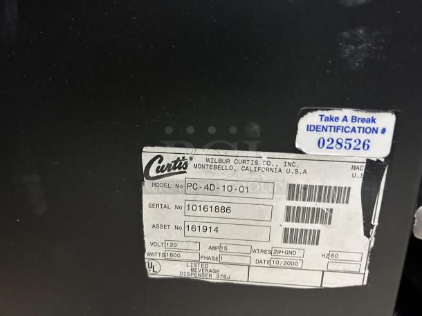 Curtis PC4 Cappuccino Machine label showing model PC-4D-10-01, serial 10161886, excellent condition, 120V, 1800W.