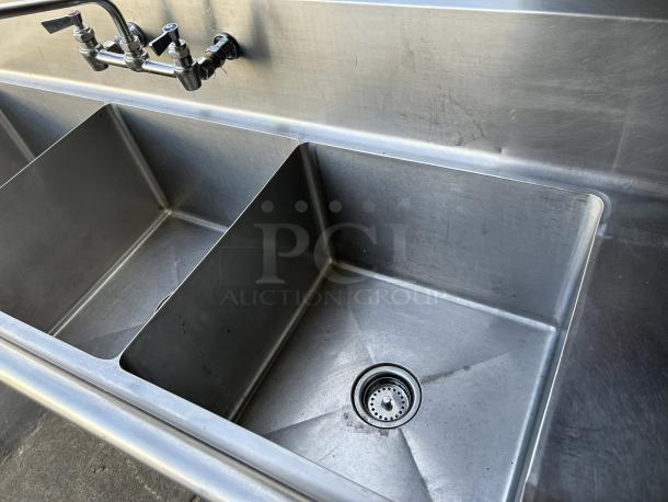 All Strong 90” 3-compartment stainless steel sink, 18” x 18” basins, with faucets; great condition.