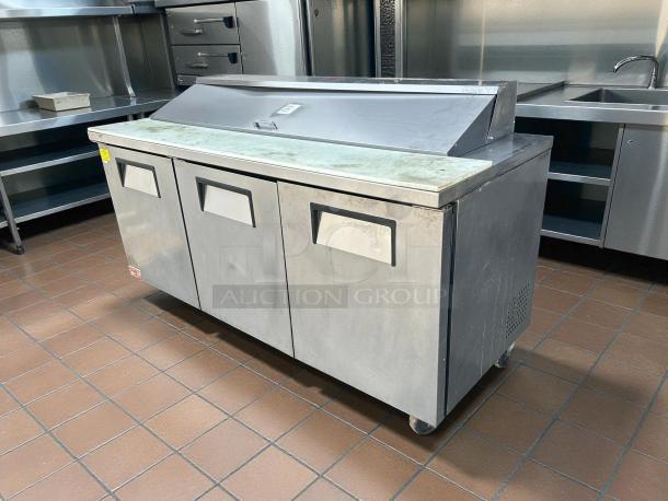 True TSSU-72-18-HC 72" three-door refrigerated sandwich prep table in excellent condition. Tested, working.