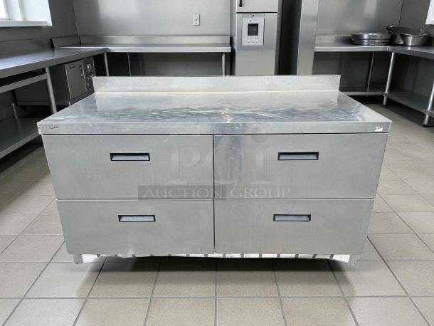 Delfield STD4460NP worktop refrigerator in excellent condition, 60 1/8" with 4 drawers and 4" backsplash, stainless steel.