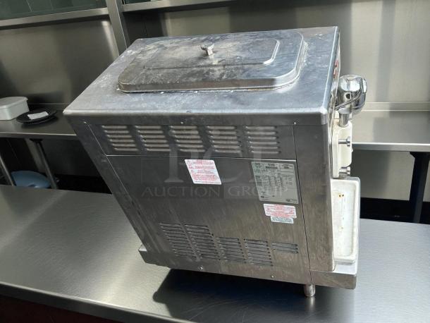 Taylor Model 490 countertop shake freezer, single flavor, excellent condition, tested and working, visible safety labels.