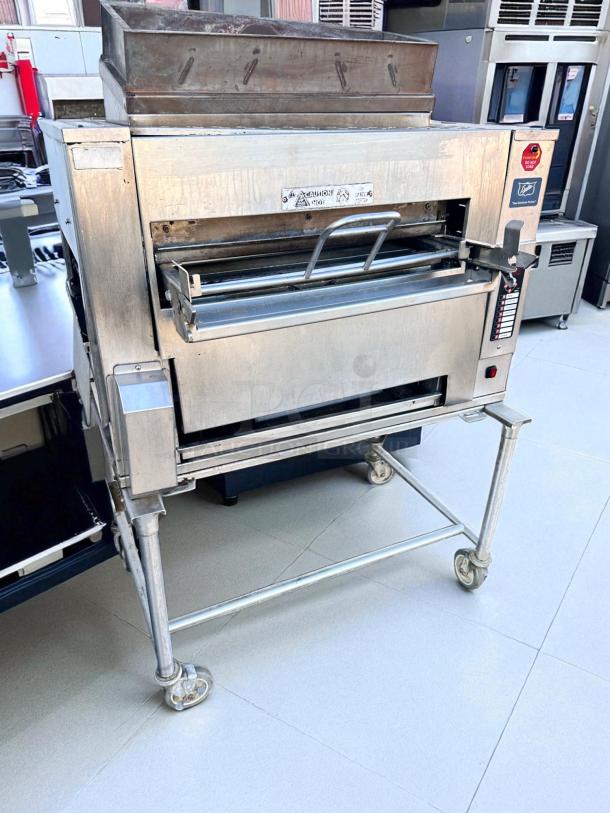 Duke FBB-NC-120 gas conveyor toaster oven, 43"W x 30"D x 53"H, excellent condition, natural gas, 120V, stainless steel finish.