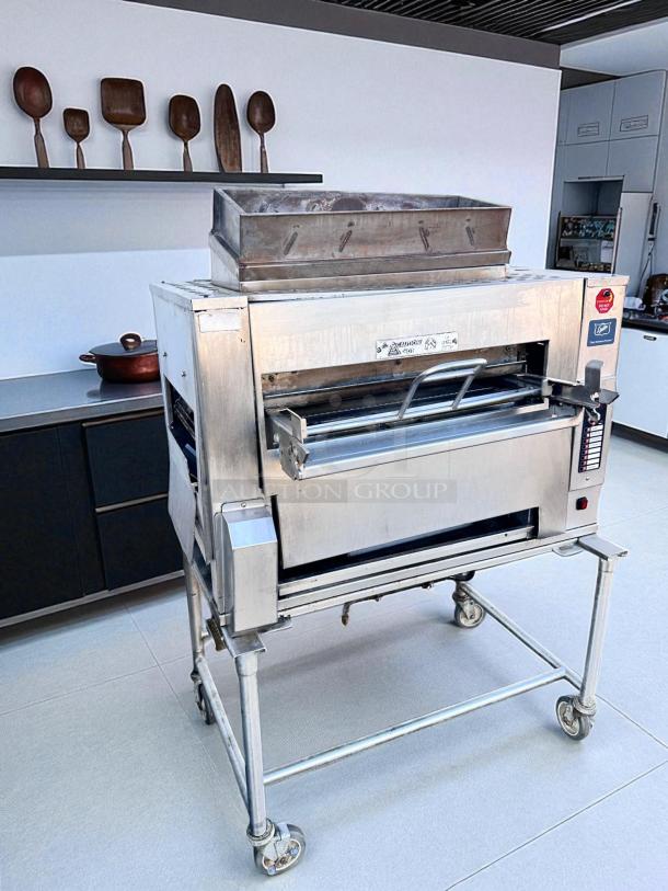 Duke FBB-NC-120 gas conveyor toaster oven, 43"W x 30"D x 53"H, stainless steel, on wheels, excellent condition, 120V, natural gas.