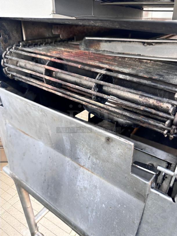 Duke FBB-NC-120 gas conveyor toaster oven in excellent condition, 43"W x 30"D x 53"H, natural gas, 120V, interior detail.