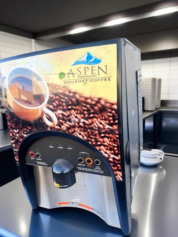 BUNN LCA-2 LP hot beverage dispenser, dual flavor, 2-hopper; fully tested, excellent condition, labeled for Aspen Gourmet Coffee.