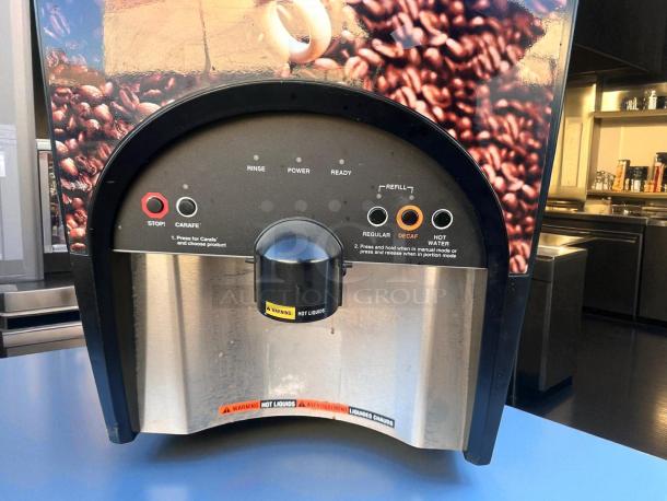 BUNN LCA-2 LP dual-flavor hot beverage dispenser, features include 2-hopper design, and warning for hot liquids, excellent condition.