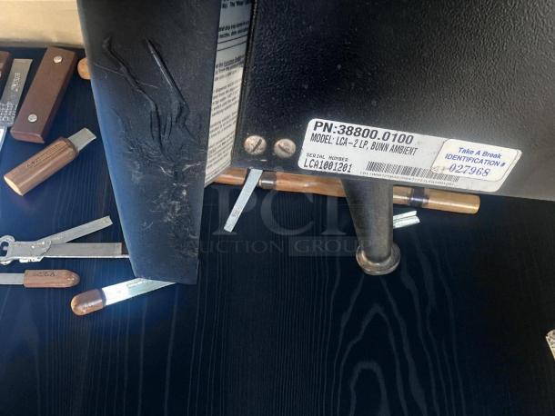 BUNN LCA-2 LP hot beverage dispenser. Dual flavor, 2-hopper design. Model and serial numbers visible. Fully tested.