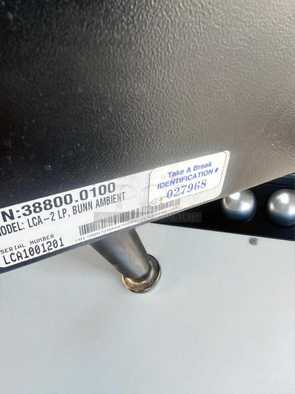 BUNN LCA-2 LP beverage dispenser, dual flavor, tags show model and serial number, excellent condition.