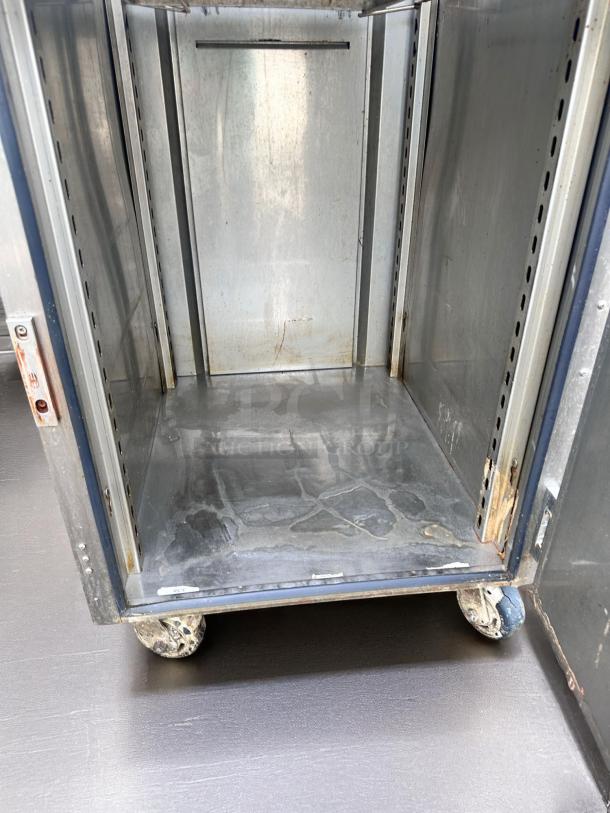 FWE UHST-13-OTB heated holding cabinet in excellent condition, 120V, stainless steel interior, on wheels, fully tested.