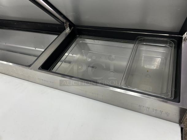 True TPP-AT-67-HC 67" pizza prep table, stainless steel, tested and working, refrigerated base, excellent condition.