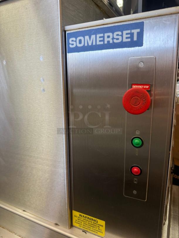 Somerset SDR-400T dough rounder in excellent condition, stainless steel, 1-36 oz capacity, 120V/3⁄4 HP, with control panel and emergency stop.