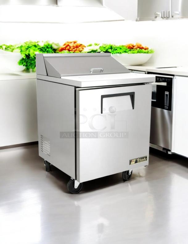 True TSSU-27-08 1-Door Sandwich/Salad Prep Table, stainless steel, tested and working, 115V, sleek design, on wheels.