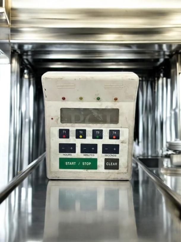 Franklin Machine Products 141-7501 digital 4-channel timer in excellent condition, with start/stop and clear buttons.