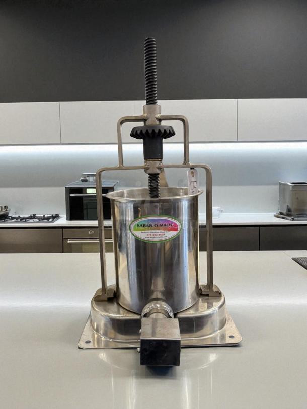 Kabab-O-Matic commercial kebab maker in excellent condition, heavy-duty stainless steel, tested and working, model from Chicago, IL.