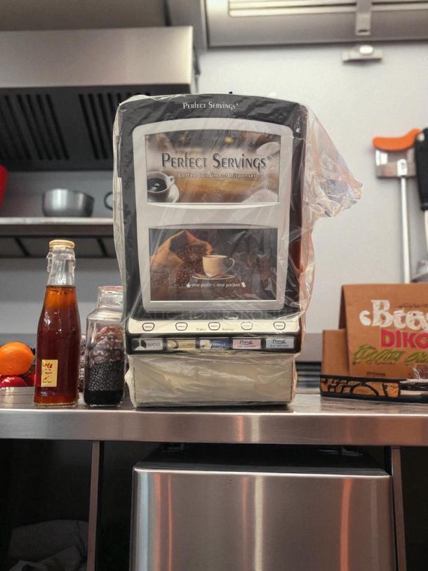 Brand new Perfect Servings UV-PSPD-5-AV-BL-T-B automatic powder dispenser, 120V, commercial grade, wrapped in plastic.