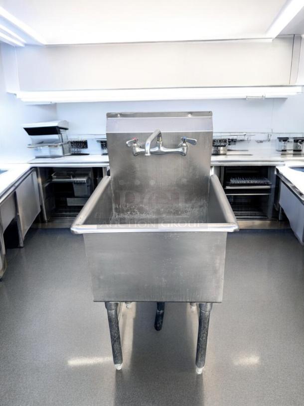 Commercial-grade stainless steel 3-compartment sink with dual drainboards, excellent condition, 98" wide, fully tested.