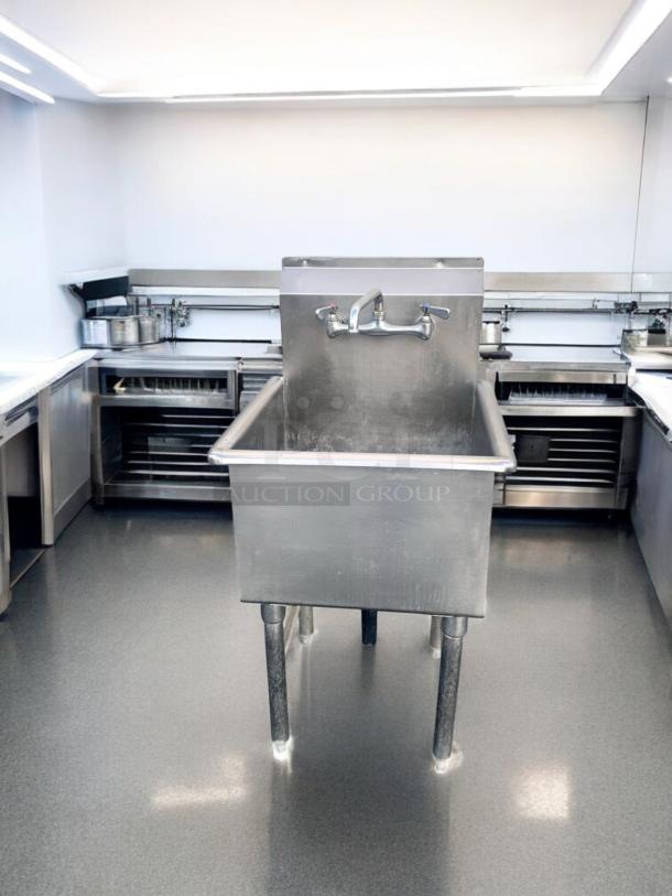 Commercial-grade stainless steel 3-compartment sink with dual drainboards, 98" wide, excellent condition, fully tested.