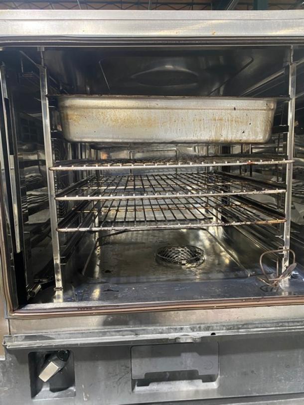 Rational iCombi Pro Series double-stacked combi oven, Model LM100CGAXXXX, stainless steel, wired rack, on legs.