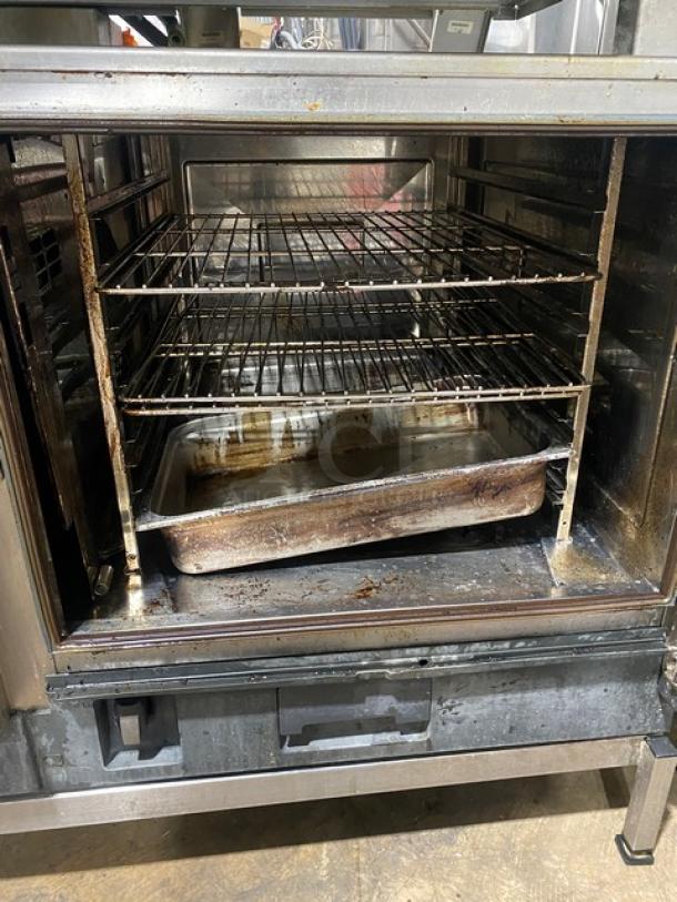Rational iCombi Pro Series double stacked combi oven, model LM100CGAXXXX, stainless steel, wired rack, natural gas, on legs.