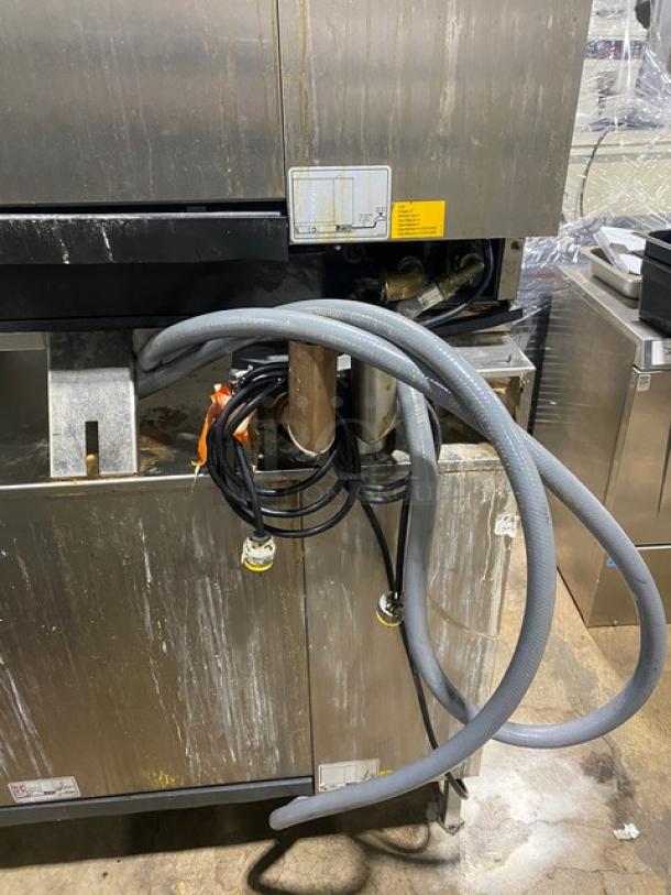 Rational iCombi Pro LM100CGAXXXX double-stacked stainless steel combi oven, natural gas, wired rack, on legs.