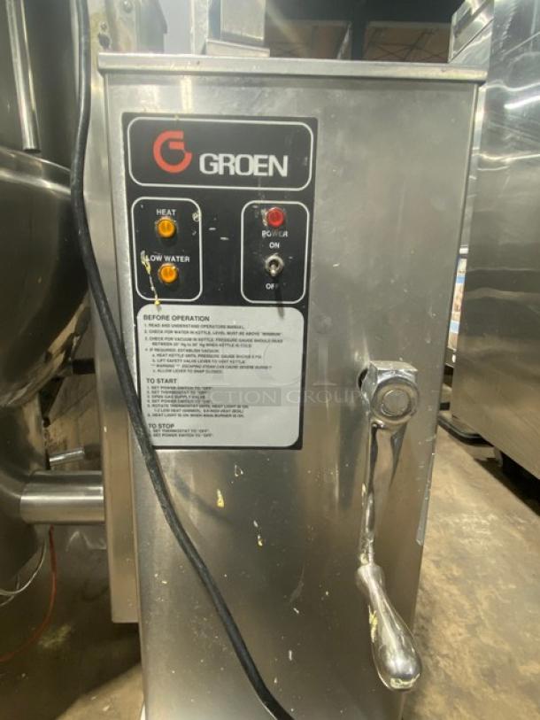 Groen Commercial Stainless Steel 40 Gal. Tilting Steam Kettle, Model DHT140, Natural Gas, 120V 1 Phase, On Legs, Controls Visible.