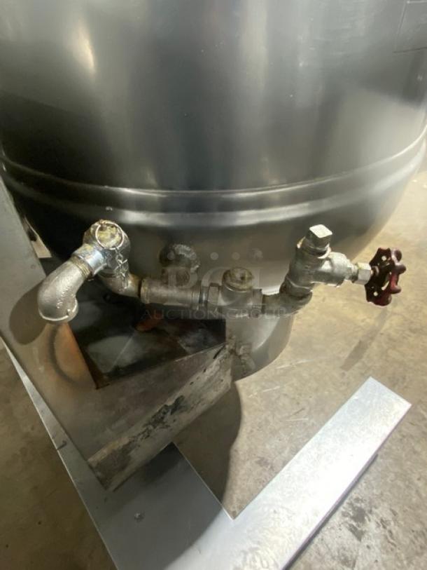 Groen stainless steel 40-gal tilting steam kettle, model DHT140, natural gas, on legs. Visible piping and valve detail.