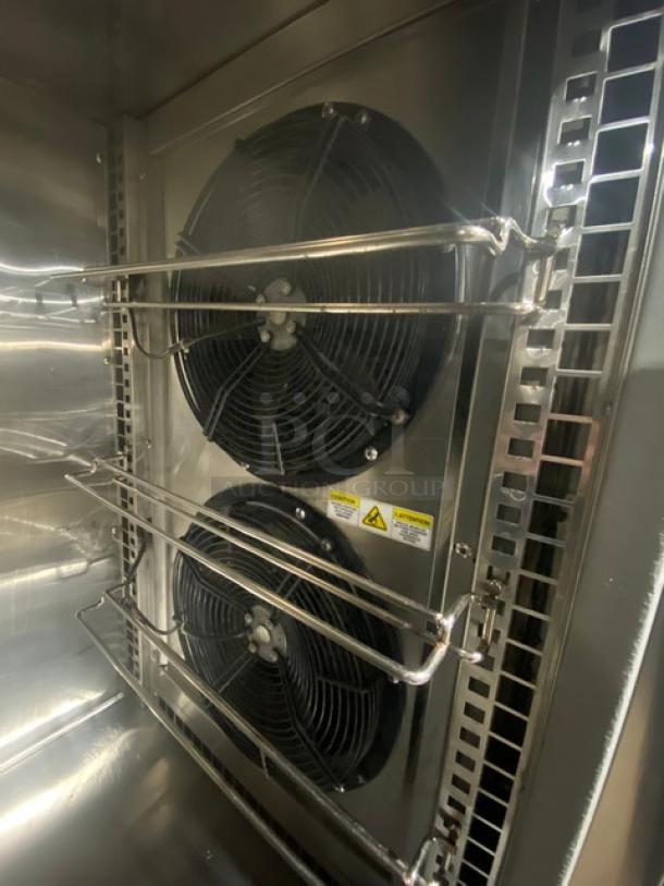 Randell BC18 stainless steel upright blast chiller interior, dual fans, labeled controls, excellent condition, on legs.
