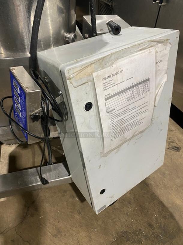 Commercial stainless steel food processing machine with Yooyist digital timer, heavy-duty, electric-powered, with control panel.