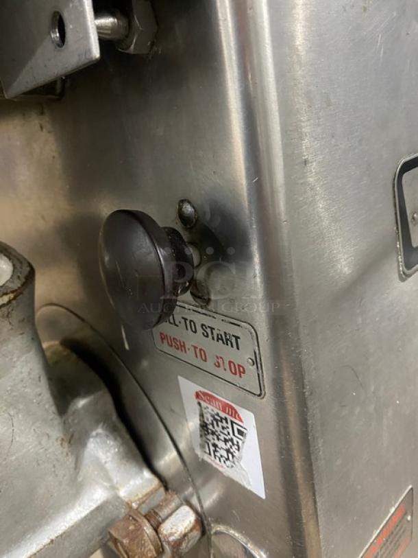 Hobart Model 4632A heavy-duty meat grinder, electric-powered, free-standing, with start-stop switch and QR code label.