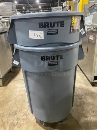 Rubbermaid BRUTE Series Commercial Gray 44 Gal. Trash Container with Dolly, in good condition, displayed in warehouse.