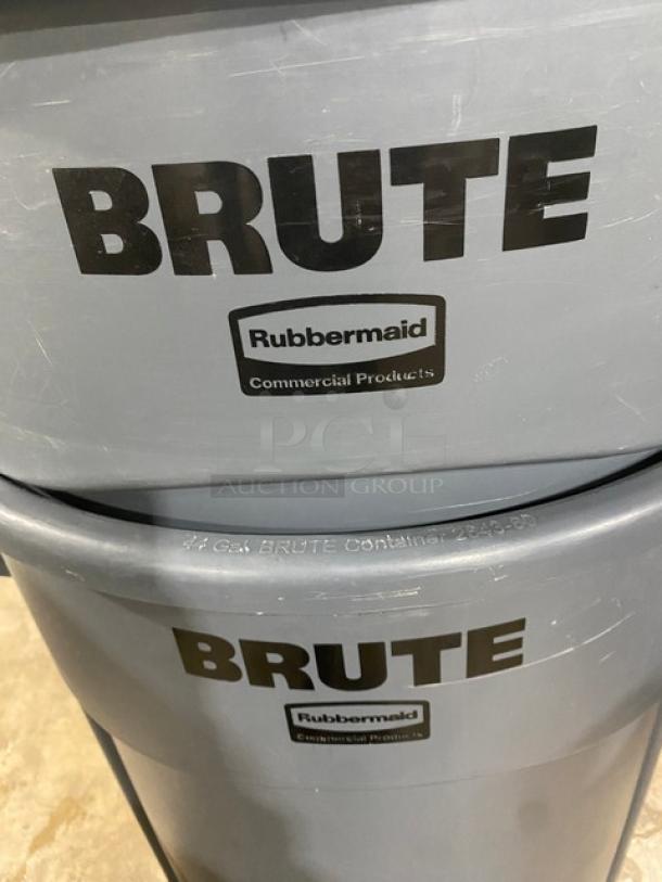 Rubbermaid BRUTE Series gray 44-gal trash container with dolly, commercial use. "BRUTE" and "Rubbermaid" labels visible.