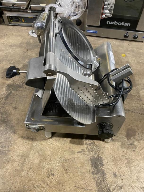 Globe commercial electric deli meat slicer on legs, countertop model. Heavy-duty steel, adjustable thickness, well-maintained.