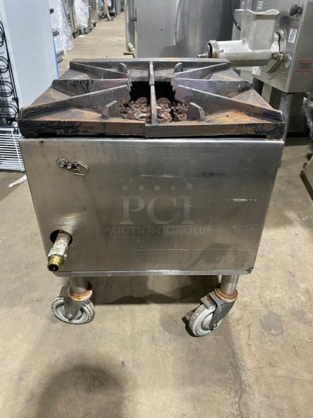 Commercial stainless steel natural gas single burner stock pot range on casters, used, durable construction.