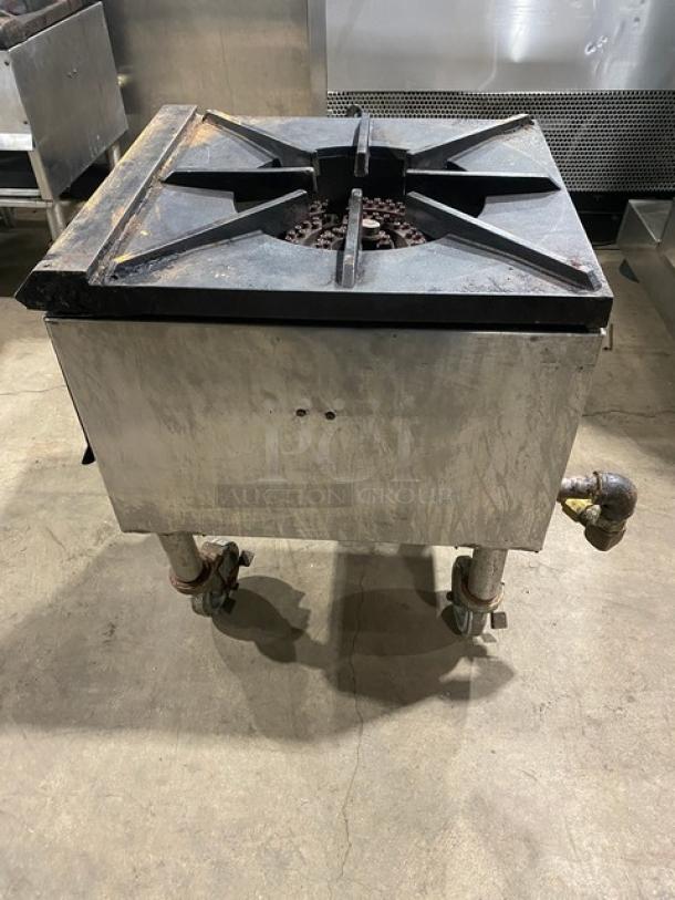 Commercial stainless steel natural gas single burner stock pot range on casters; features durable construction, adjustable flame.