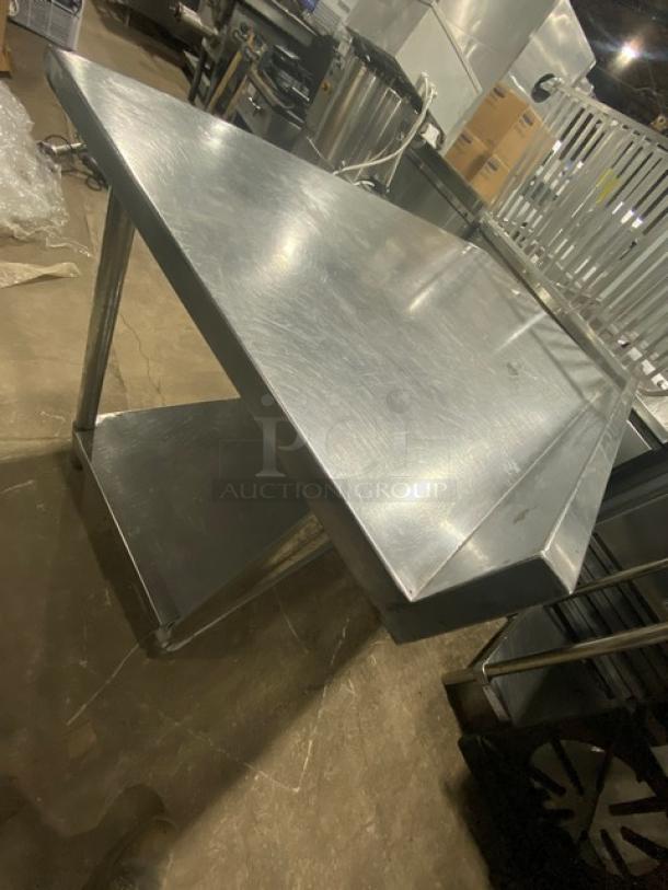 Commercial stainless steel worktop table with undershelf and up-turned backsplash, excellent condition.