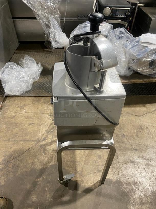 Robot Coupe CL50 Ultra Series food processor on a stand with casters, commercial-grade, electric-powered, with continuous-feed.