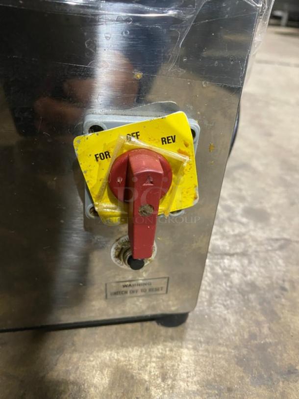 American Eagle stainless steel meat grinder, model AE-G22N. Features on/off/reverse switch. Electric, 115V, 1 phase.