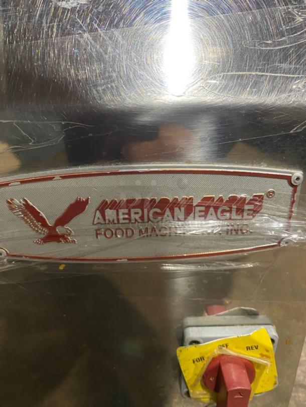 American Eagle stainless steel electric meat grinder, model AE-G22N. Features: 115V, 1 phase, bench model, serial number 22N2308169.