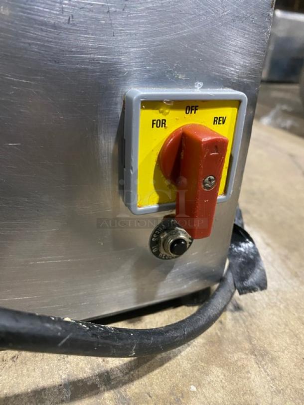 American Eagle AE-G22N stainless steel meat grinder, electric, bench model, 115V, on legs. Control knob shown.