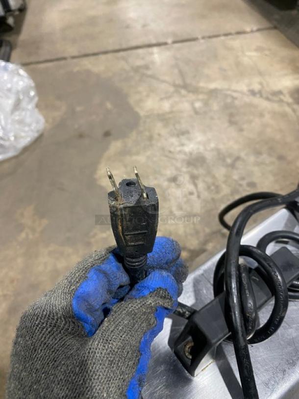 American Eagle AE-G22N meat grinder plug shown. Features 115V, 1 phase power. Includes coiled cord.