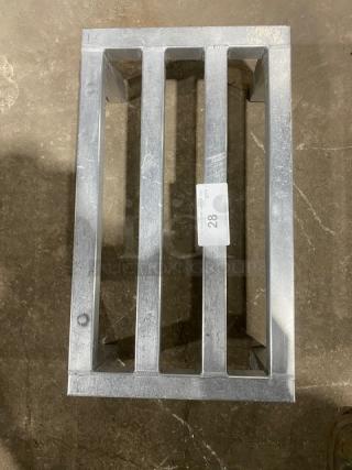 Commercial heavy-duty aluminum dunnage rack on legs, three slats, sturdy condition, tagged with "28."