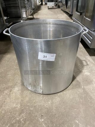 Commercial heavy-duty round stock pot with handles, metal, label indicates auction item number 31, showing signs of use.