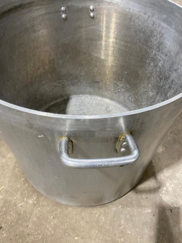 Commercial heavy-duty round stock pot with handles, used condition, durable metal construction, perfect for large-scale cooking.