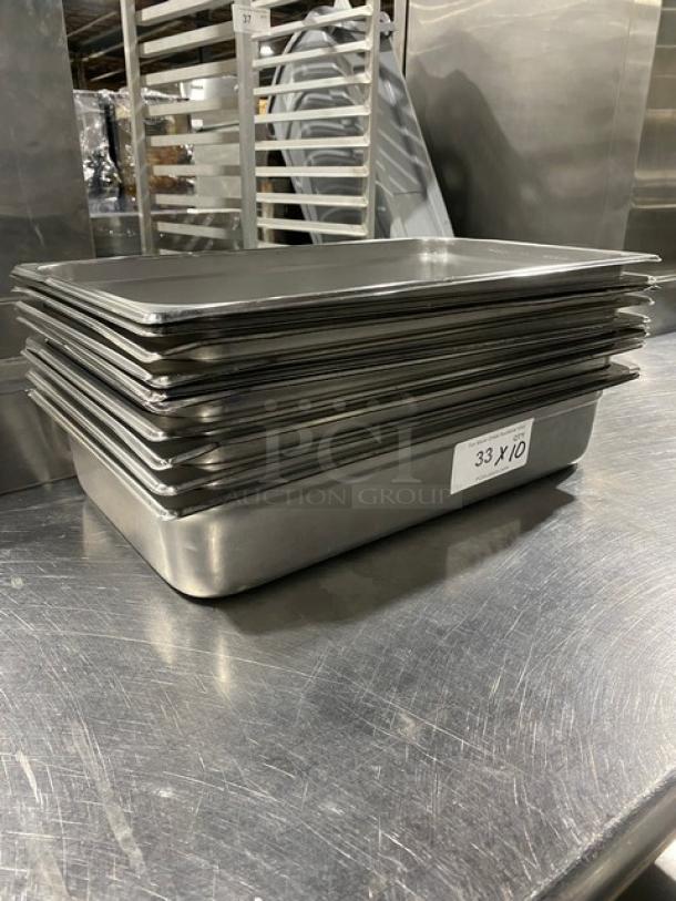 Winco SPJM-104 stainless steel full-size anti-jam steamtable pans. Stack of 10 pans. Used condition.
